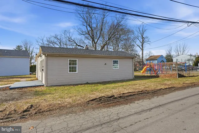 a view of a backyard of a house