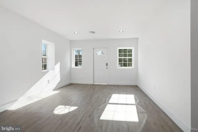 an empty room with windows