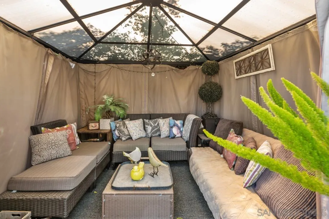 12814 Iola Way Poway, CA 92064 - Photo 29 of 36 a living room with furniture and a wooden floor
