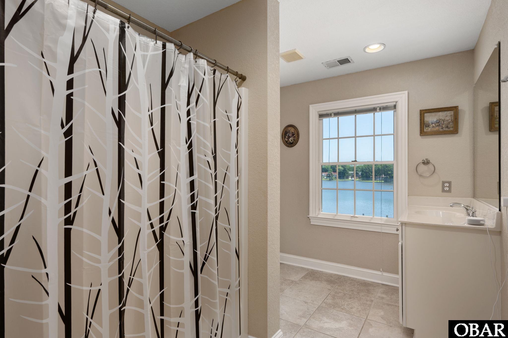 6021 Martins Point Road, Unit 31 Kitty Hawk, NC 27949 - Photo 26 of 50 Ensuite Bath