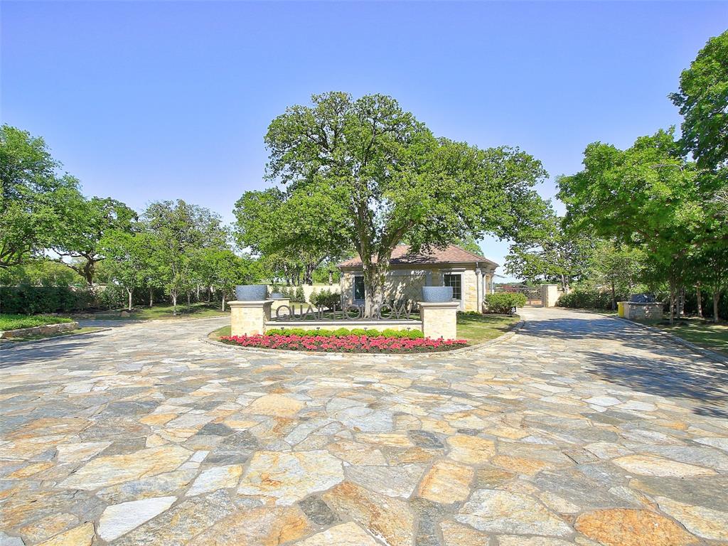 a view of a house with swimming pool and sitting area