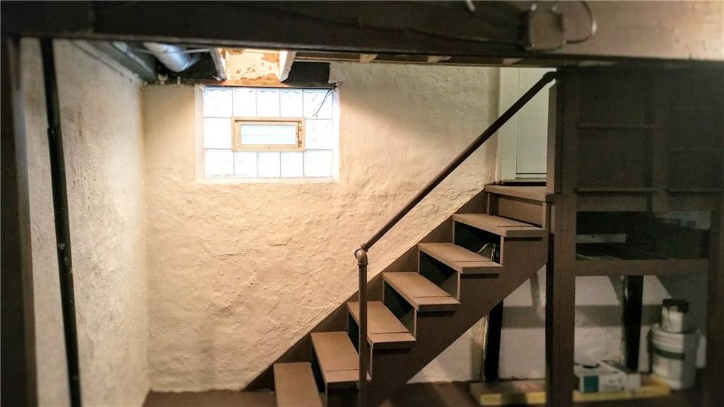 1516 Beaver Road Ambridge, PA 15003 - Photo 20 of 24 STAIRS LEADING TO THE SPOTLESS BASEMENT.