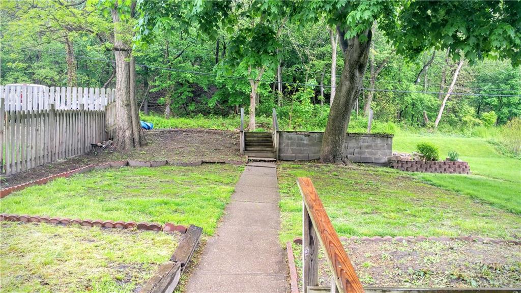 1516 Beaver Road Ambridge, PA 15003 - Photo 23 of 24 BACKYARD LEADING TO THE OFF STREET PARKING....PRETTY SETTING