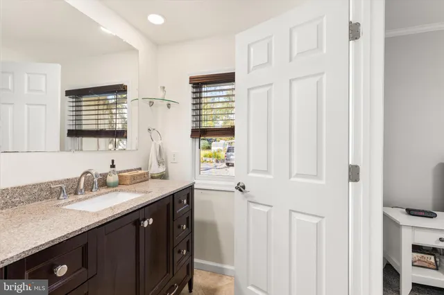 a bathroom with a shower a toilet and a shower