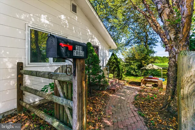 a view of a house with a tree