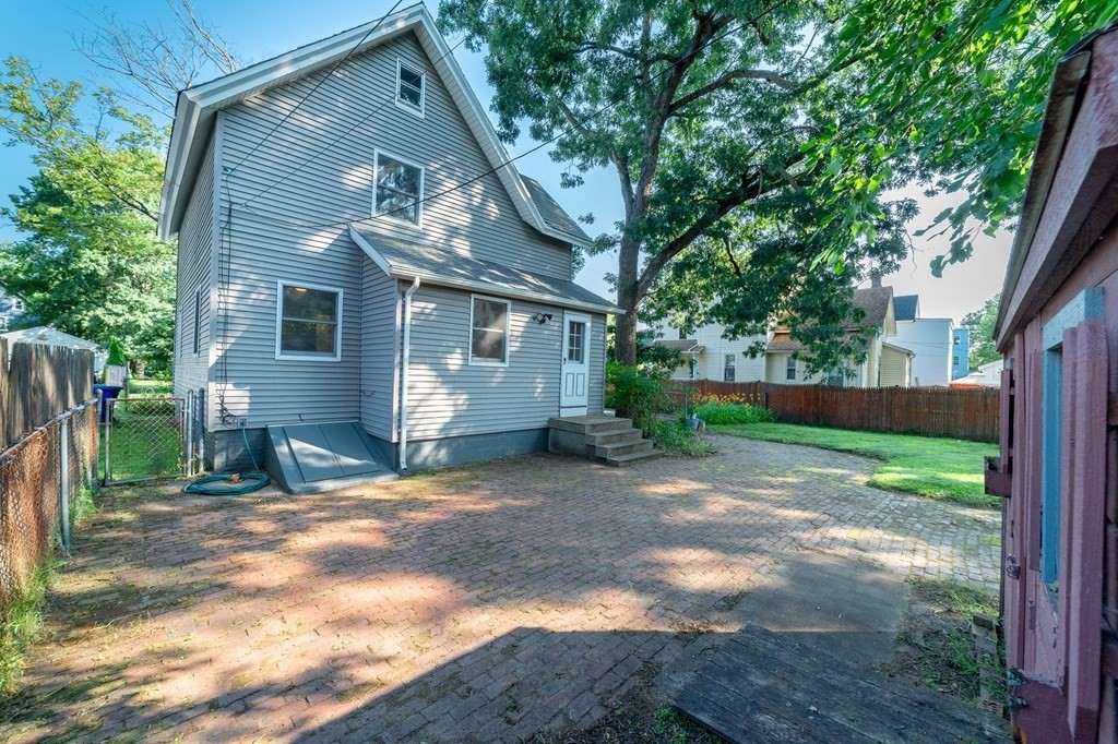 67 Keith Street Springfield, MA 01108 - Photo 25 of 27 a view of a house with a yard
