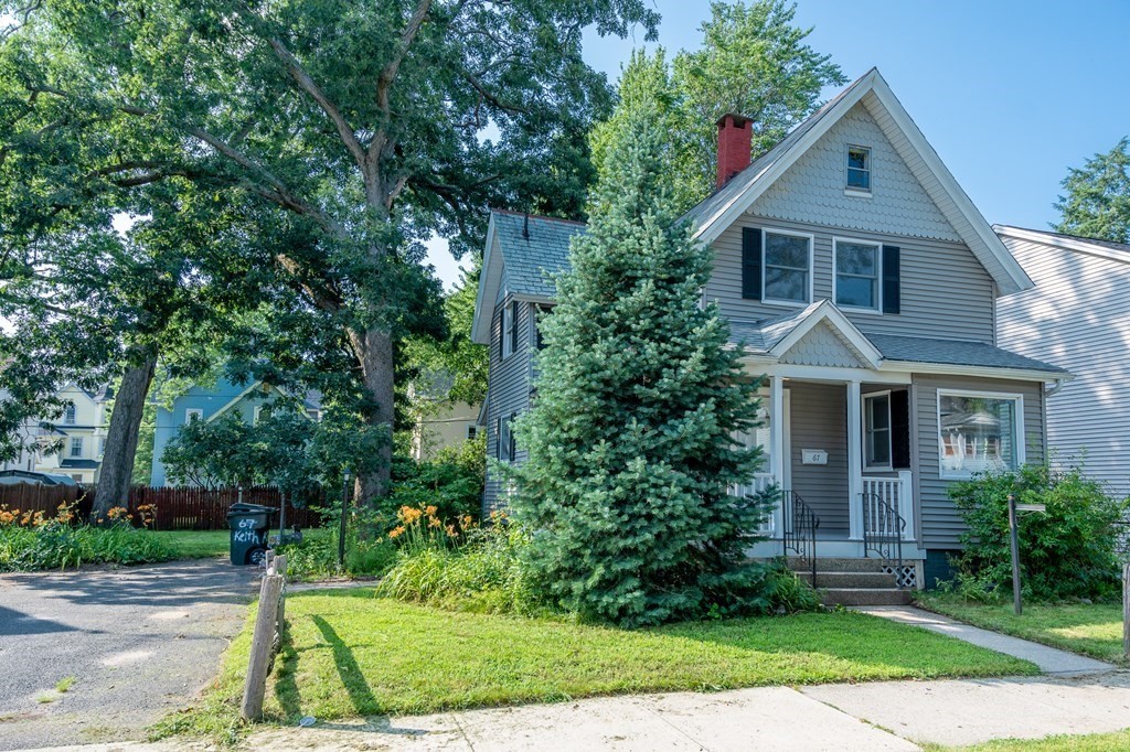 67 Keith Street Springfield, MA 01108 - Photo 5 of 27 a front view of a house with a yard