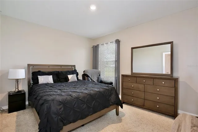 an aerial view of residential houses and outdoor space