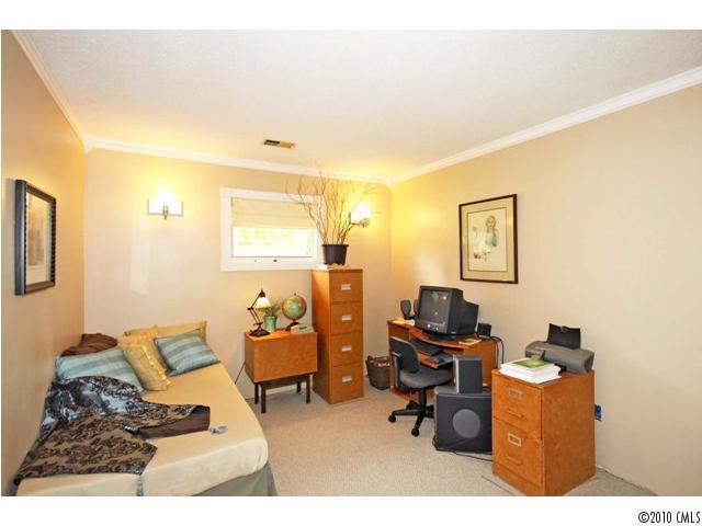 2219 Long Hope Road Monroe, NC 28112 - Photo 13 of 16 a bedroom with a workspace