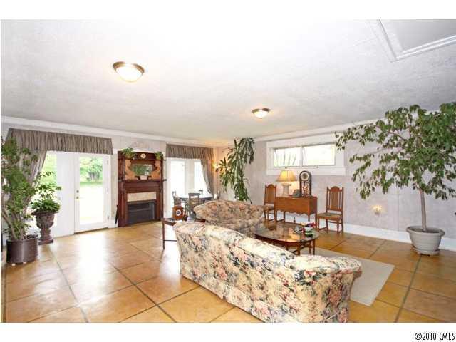 2219 Long Hope Road Monroe, NC 28112 - Photo 7 of 16 a living room with furniture and a large window