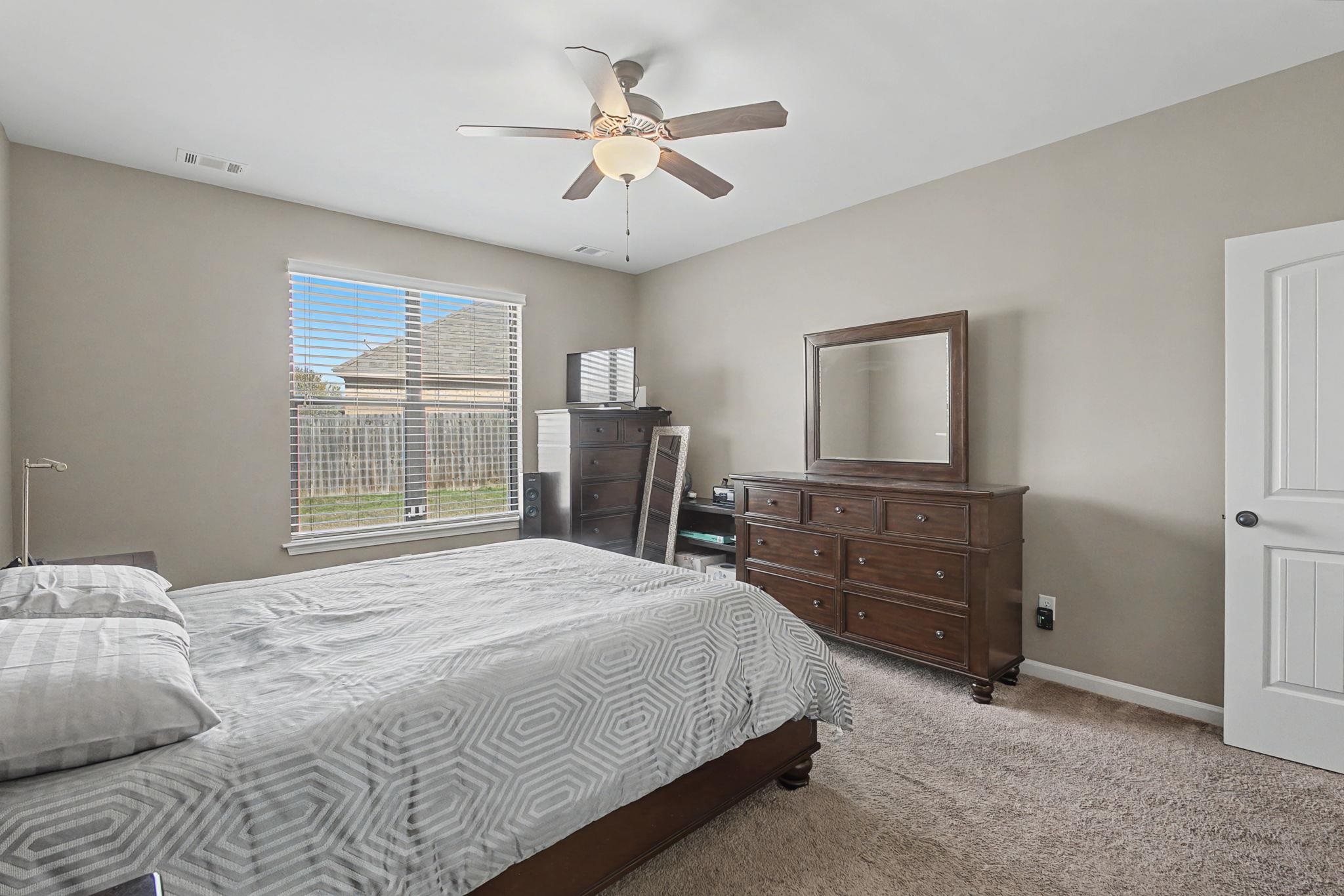 12436 Dusty Field Road Arlington, TN 38002 - Photo 18 of 40 Bedroom featuring carpet and a ceiling fan