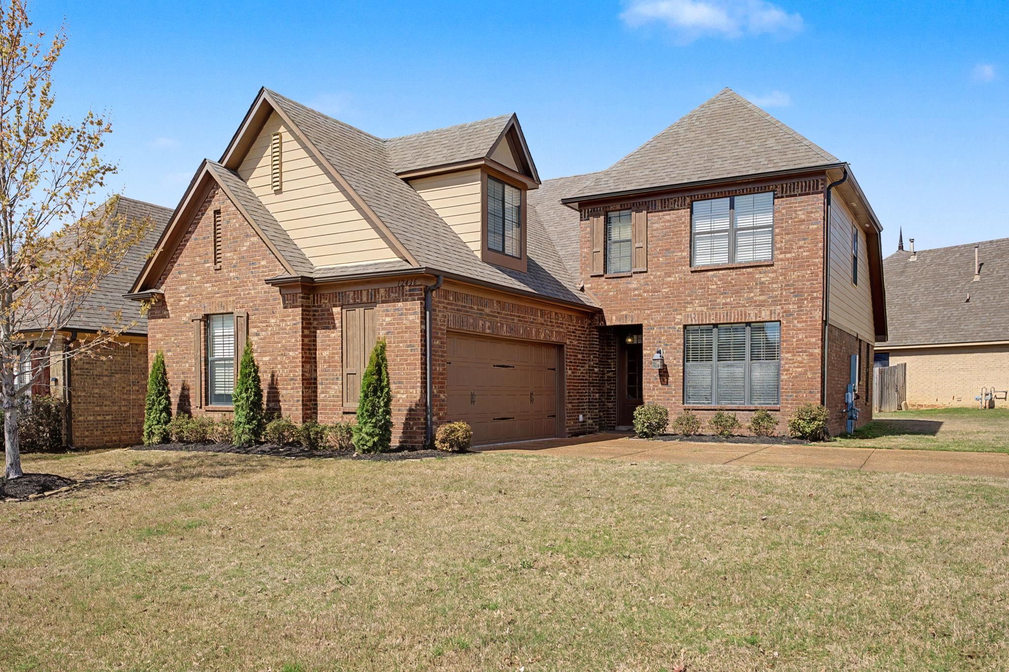 12436 Dusty Field Road Arlington, TN 38002 - Photo 2 of 40 View of front facade with roof with shingles, a front lawn, and brick siding