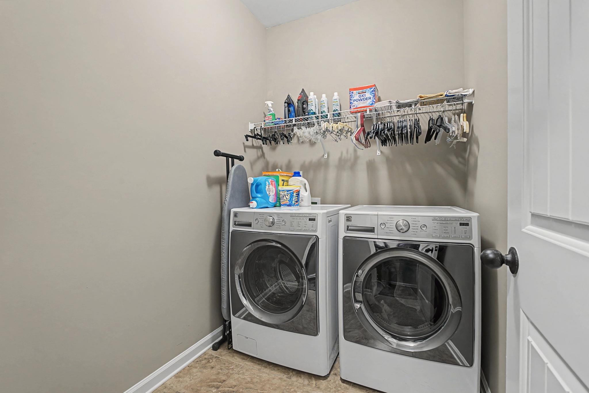 12436 Dusty Field Road Arlington, TN 38002 - Photo 24 of 40 Laundry room featuring baseboards and separate washer and dryer