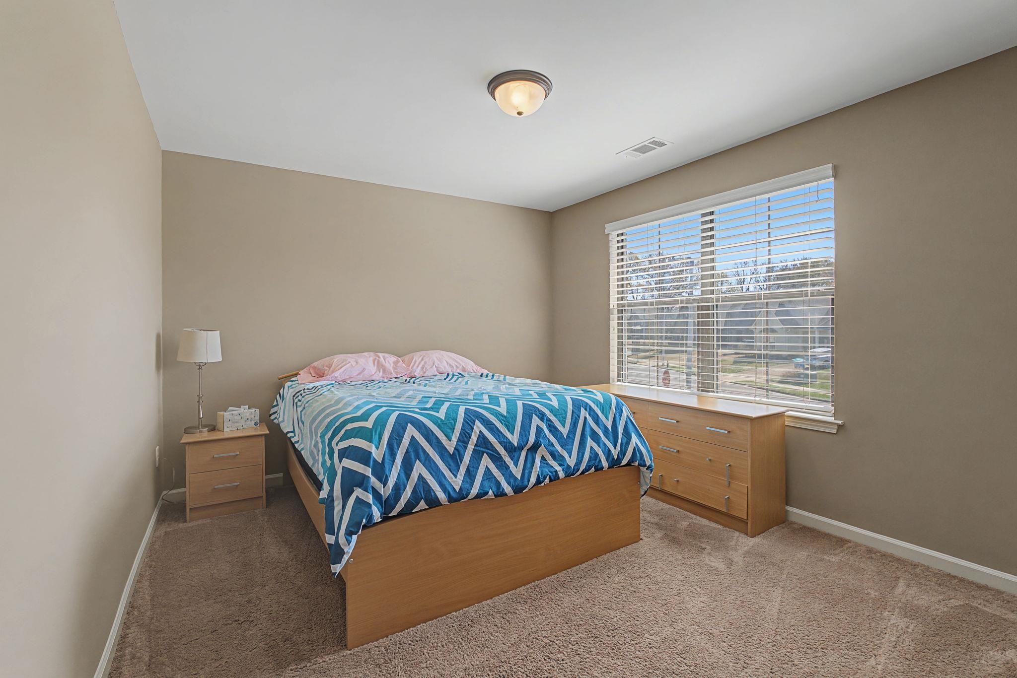 12436 Dusty Field Road Arlington, TN 38002 - Photo 27 of 40 Carpeted bedroom with baseboards
