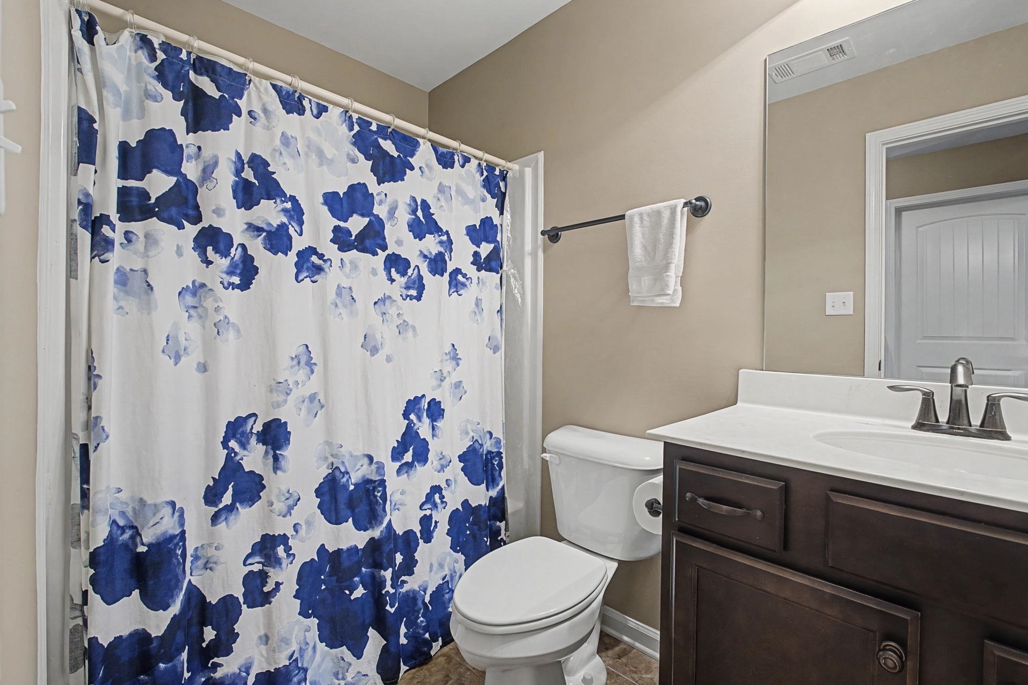12436 Dusty Field Road Arlington, TN 38002 - Photo 31 of 40 Bathroom featuring vanity and curtained shower