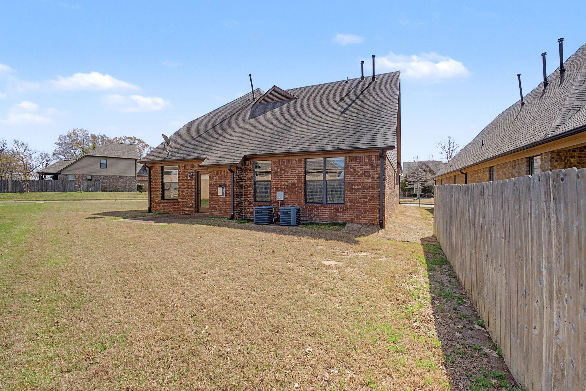 12436 Dusty Field Road Arlington, TN 38002 - Photo 35 of 40 Back of property with roof with shingles and brick siding