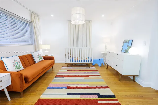 a room with furniture and a rug