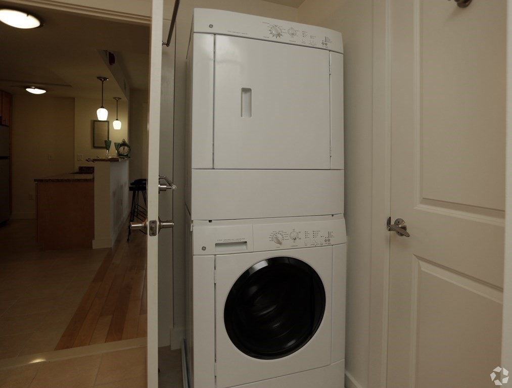 87 New Street, Unit 204 Cambridge, MA 02138 - Photo 9 of 14 a utility room with dryer and washer