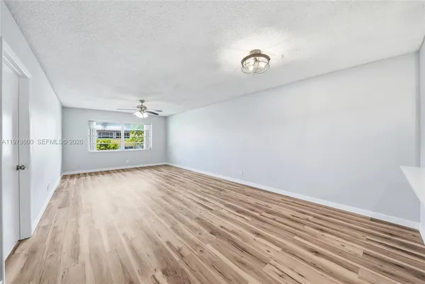 a bedroom with a bed and furniture