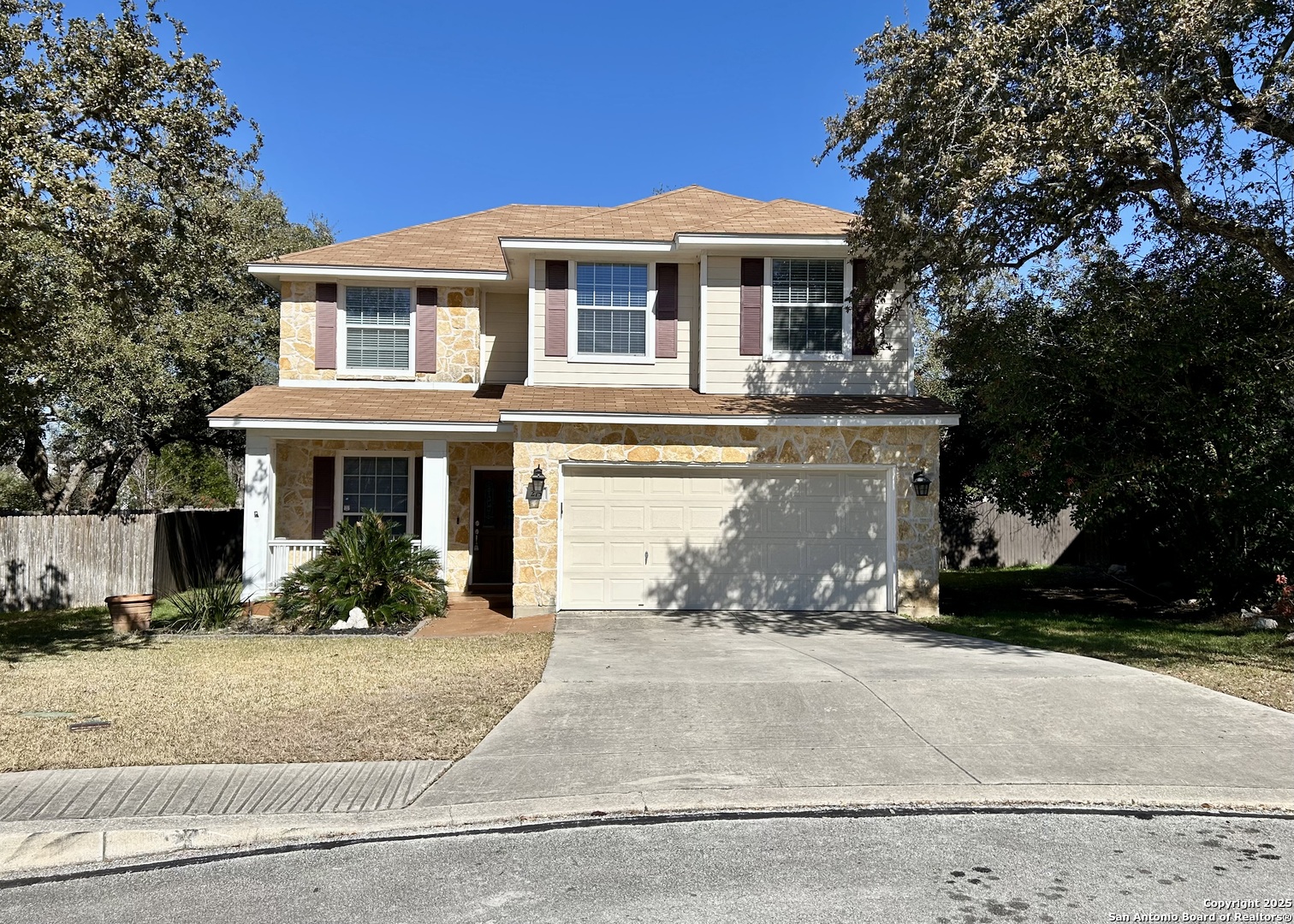 a front view of a house with yard