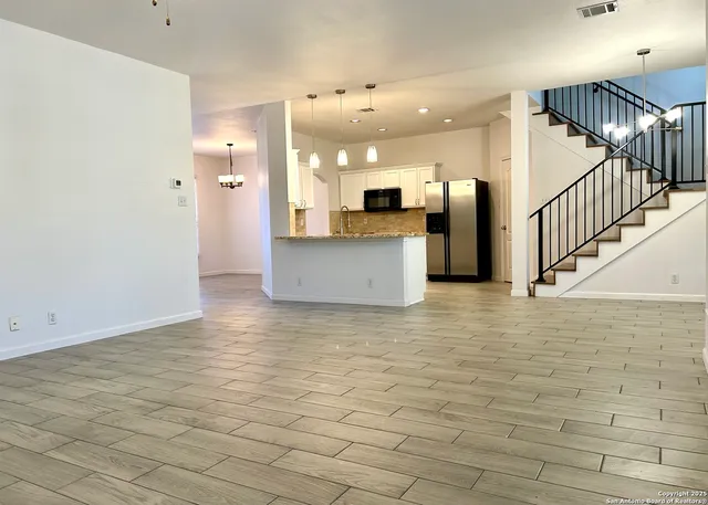 a view of a kitchen with a sink