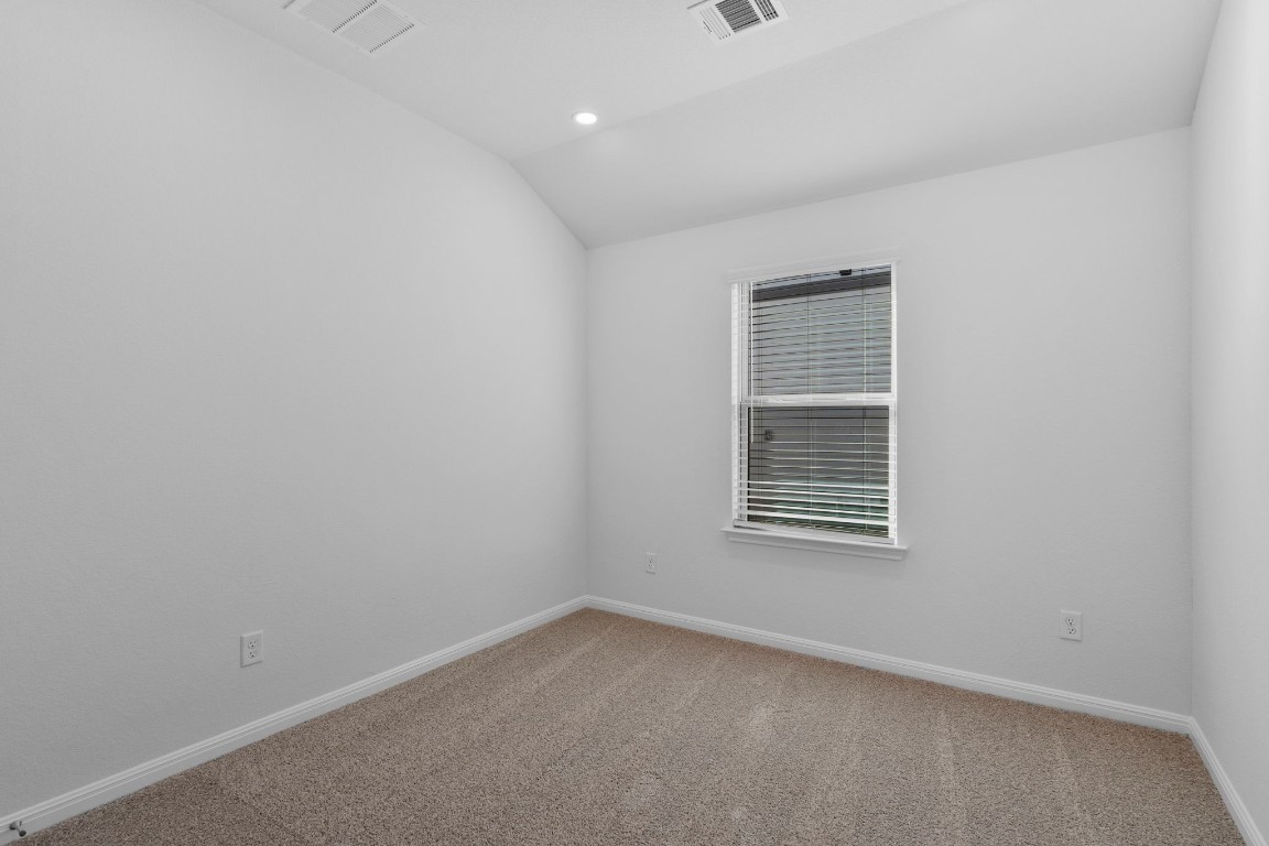 125 Hatari Trail Jarrell, TX 76537 - Photo 12 of 40 an empty room with a window
