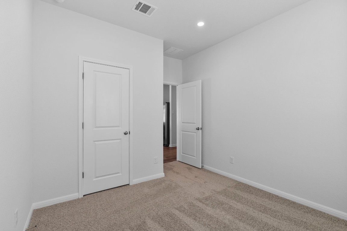 125 Hatari Trail Jarrell, TX 76537 - Photo 16 of 40 an empty room with closet area