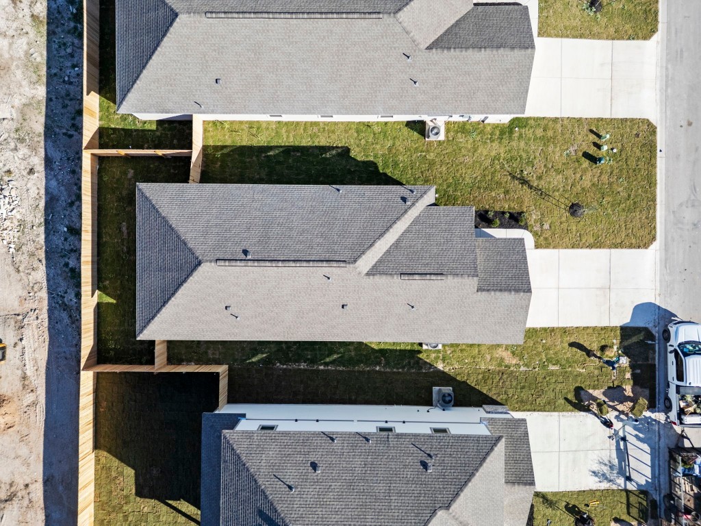 125 Hatari Trail Jarrell, TX 76537 - Photo 32 of 40 an aerial view of a house with a yard