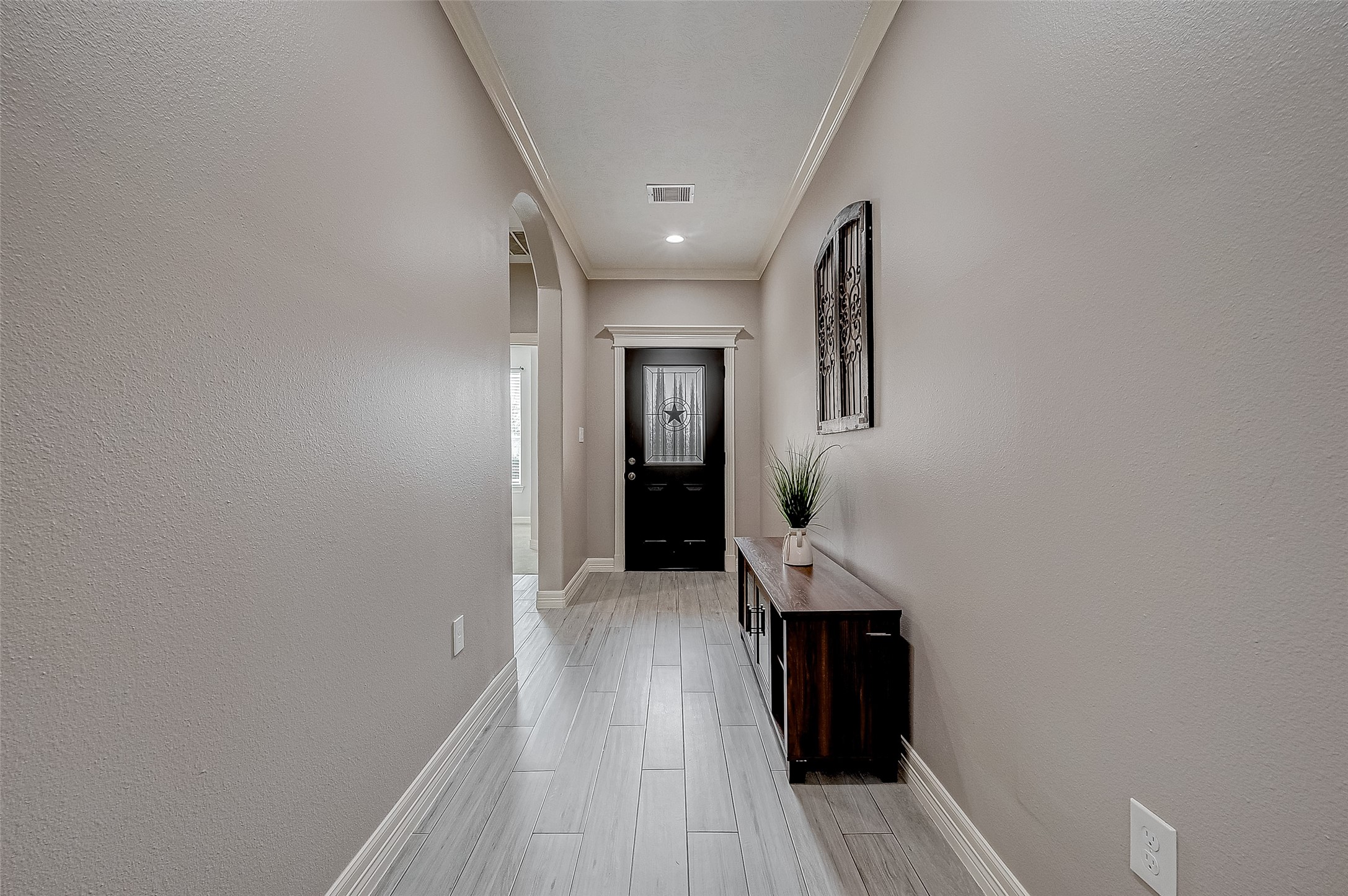 709 Coen Road Rosharon, TX 77583 - Photo 3 of 33 a view of hallway with wooden floor
