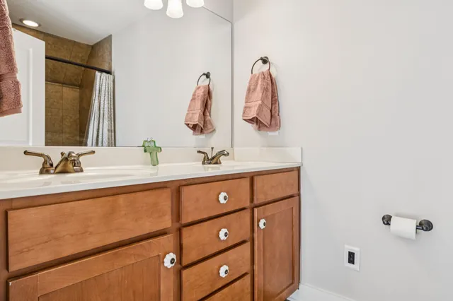 a bathroom with a shower curtain
