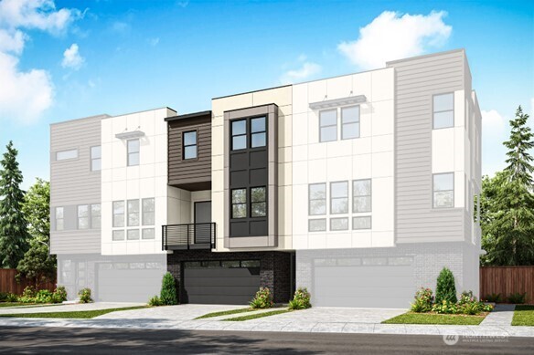 a front view of a building with a garden