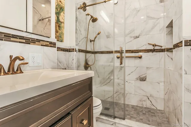 a bathroom with a sink and mirror