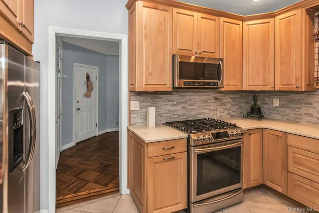 a kitchen with a stove and a microwave