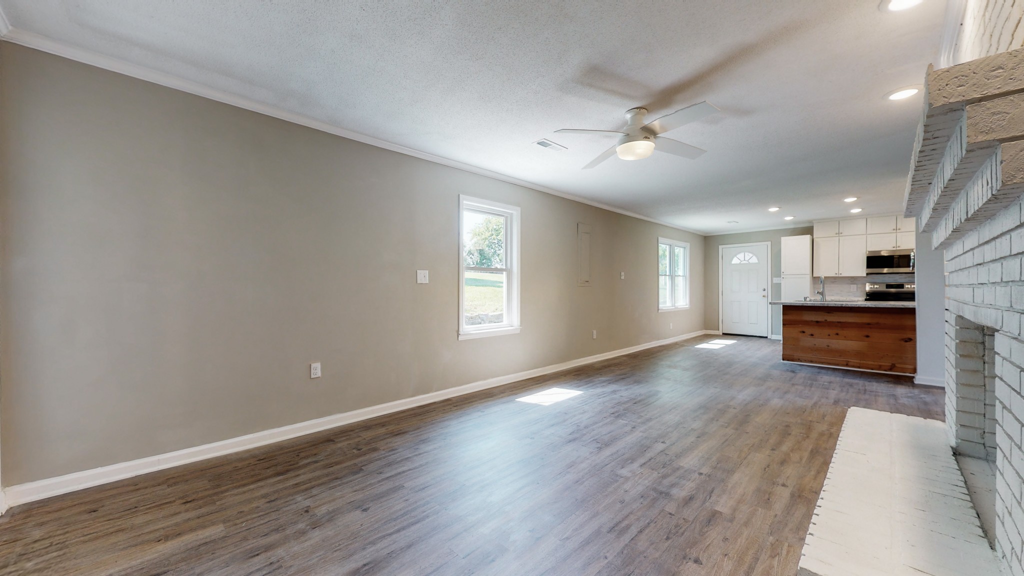 28 Providence Road Fayetteville, TN 37334 - Photo 11 of 48 a view of kitchen and hall with wooden floor