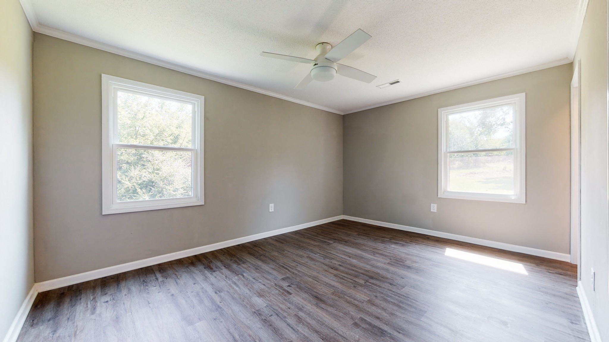 28 Providence Road Fayetteville, TN 37334 - Photo 15 of 48 a view of an empty room with wooden floor and a window