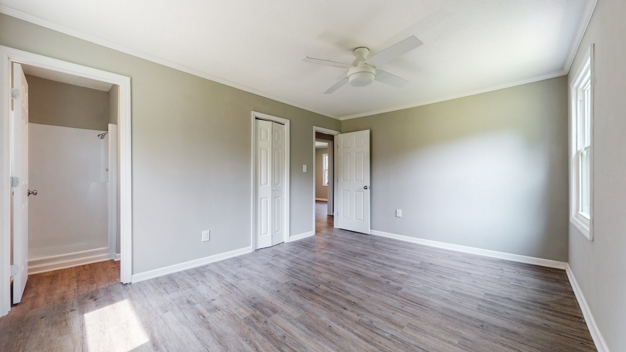 28 Providence Road Fayetteville, TN 37334 - Photo 16 of 48 a view of an empty room with wooden floor and a window