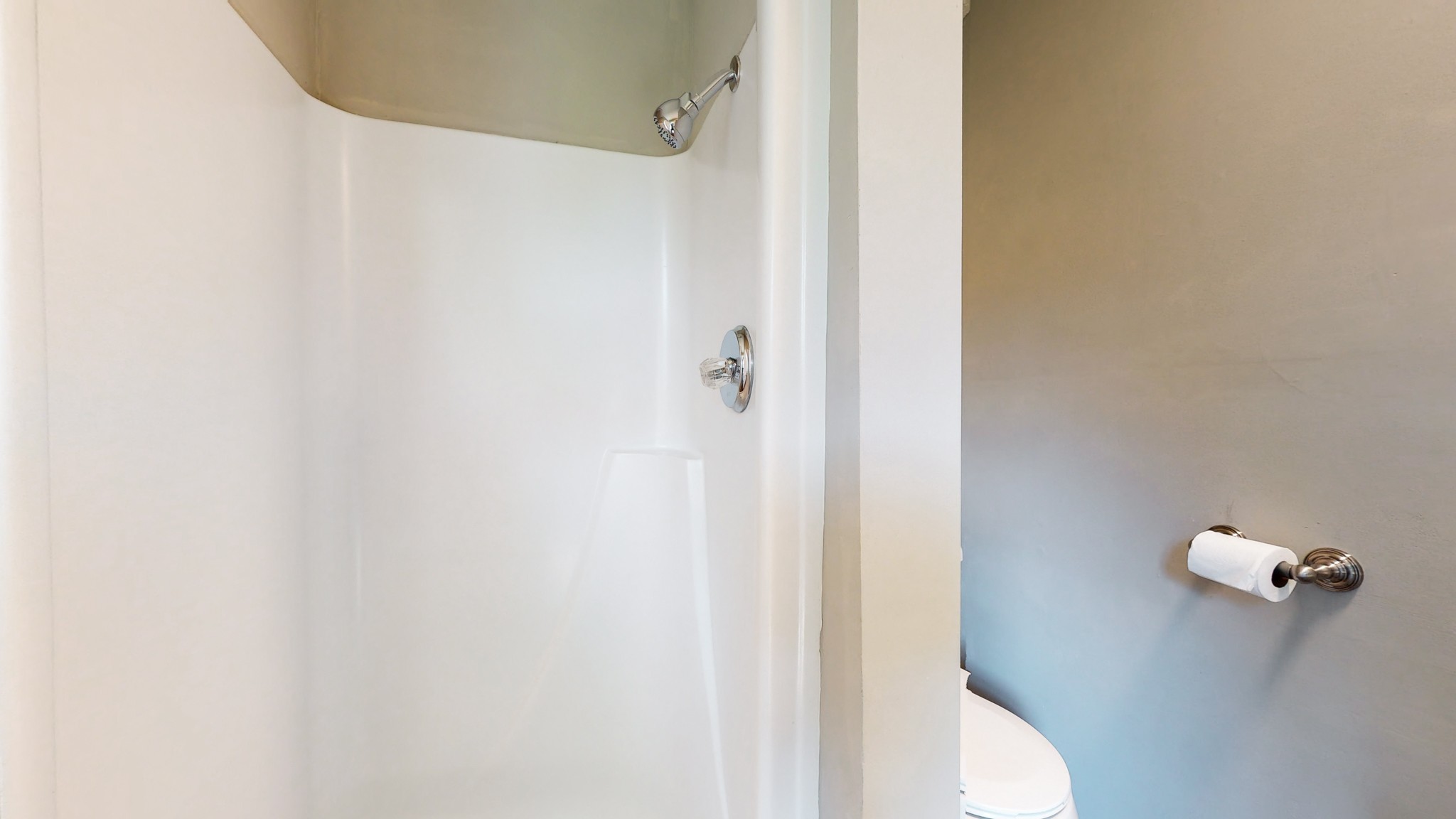 28 Providence Road Fayetteville, TN 37334 - Photo 17 of 48 a bathroom with a shower and toilet