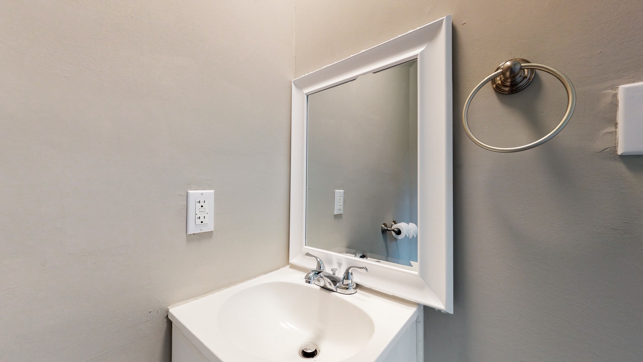 28 Providence Road Fayetteville, TN 37334 - Photo 18 of 48 a bathroom with a sink a mirror and a light fixture