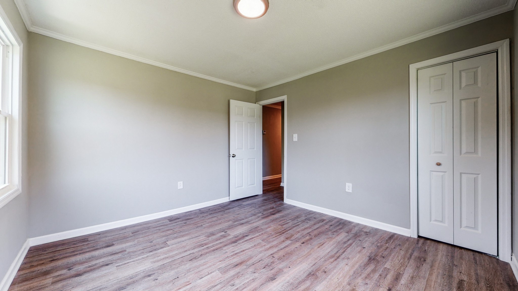 28 Providence Road Fayetteville, TN 37334 - Photo 20 of 48 a view of an empty room with wooden floor