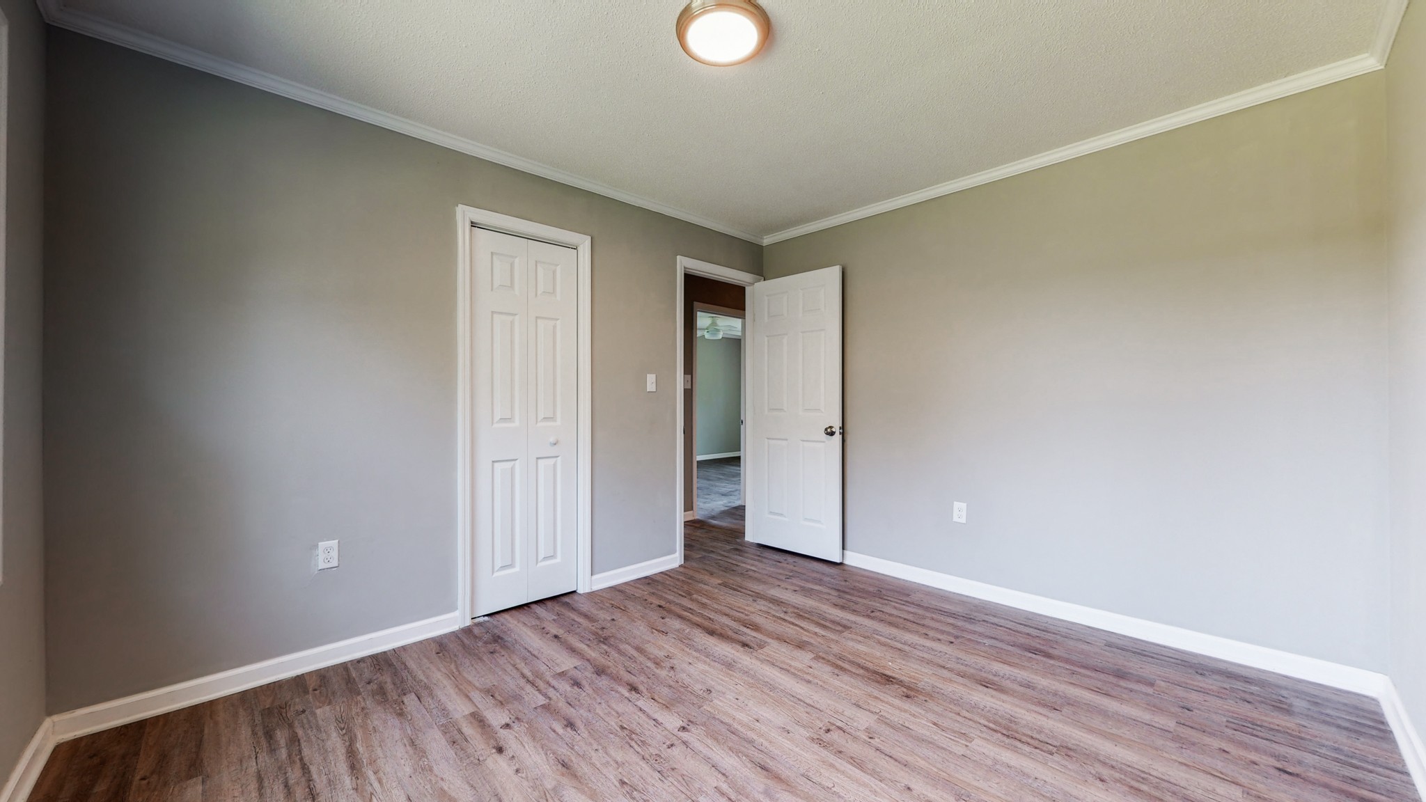28 Providence Road Fayetteville, TN 37334 - Photo 22 of 48 a view of an empty room with wooden floor and closet