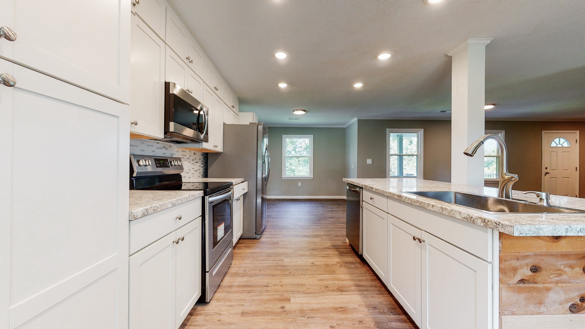 28 Providence Road Fayetteville, TN 37334 - Photo 5 of 48 a large kitchen with stainless steel appliances lots of counter space and a sink