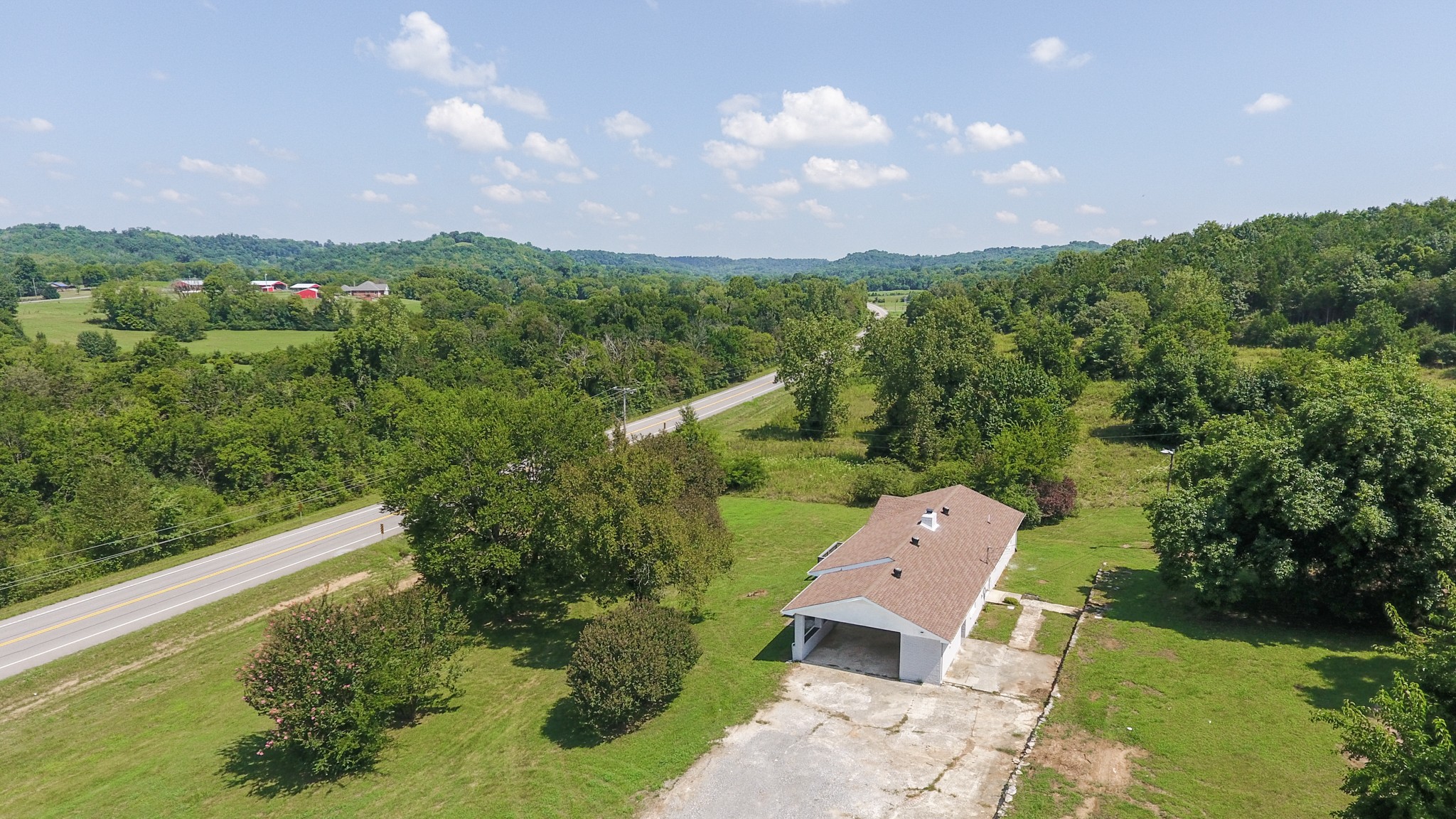 28 Providence Road Fayetteville, TN 37334 - Photo 42 of 48 an aerial view of a house with a garden