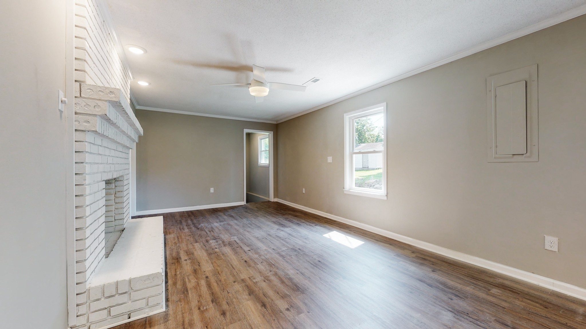 28 Providence Road Fayetteville, TN 37334 - Photo 10 of 48 an empty room with wooden floor and windows