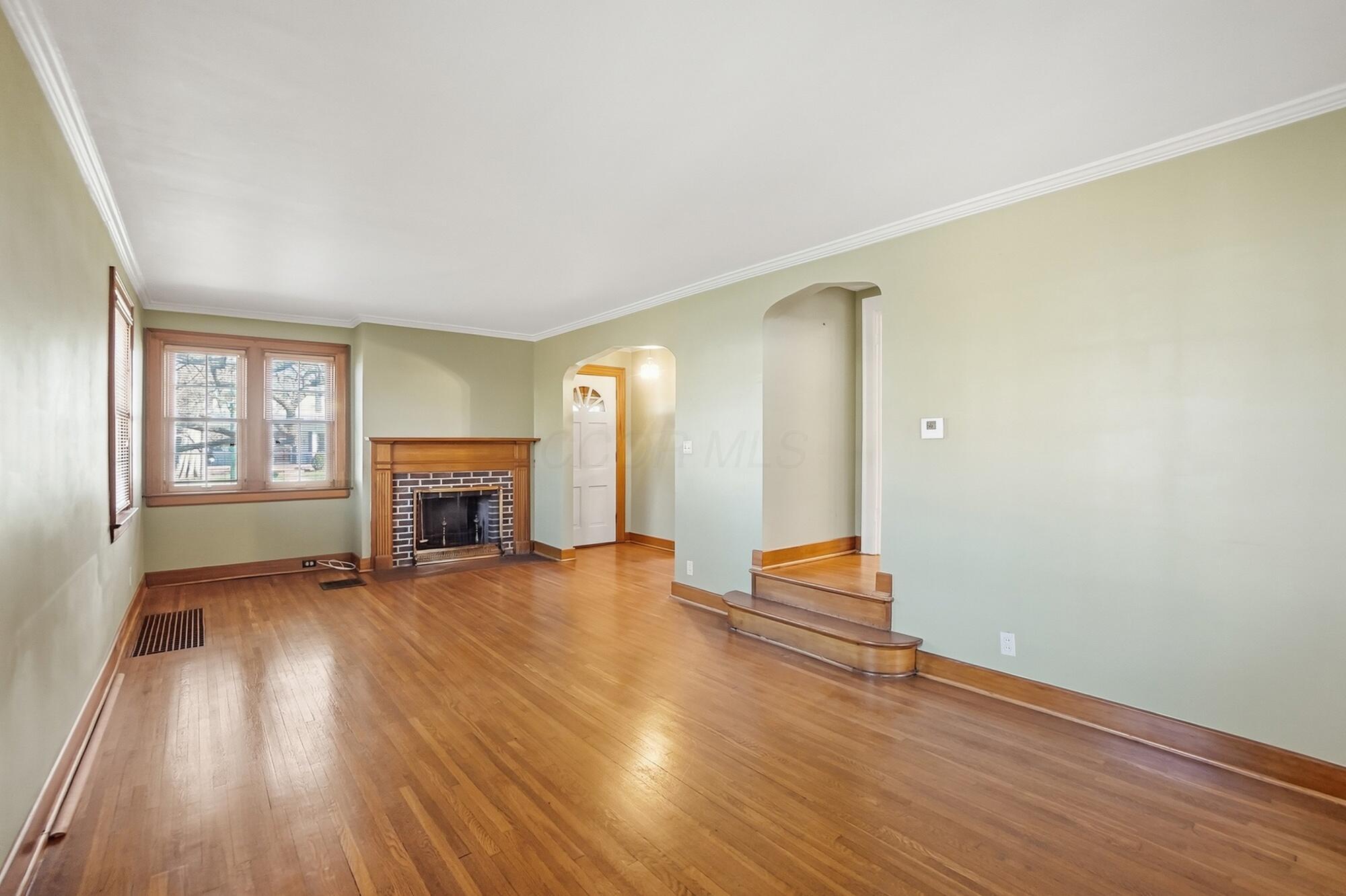 1627 Doone Road Upper Arlington, OH 43221 - Photo 14 of 37 The fireplace adds charm to the area.
