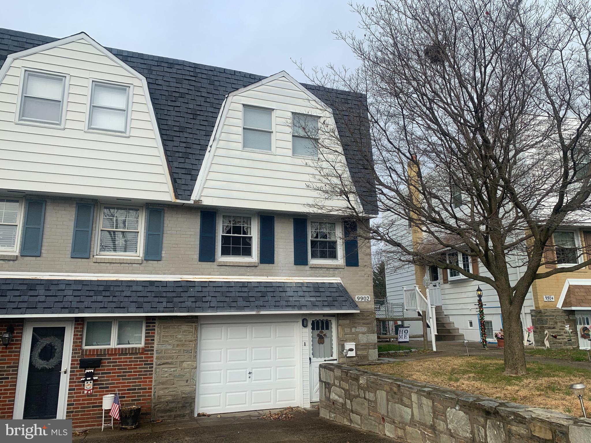 9902 Medway Road Philadelphia, PA 19115 - Photo 1 of 28 a front view of a house with a yard