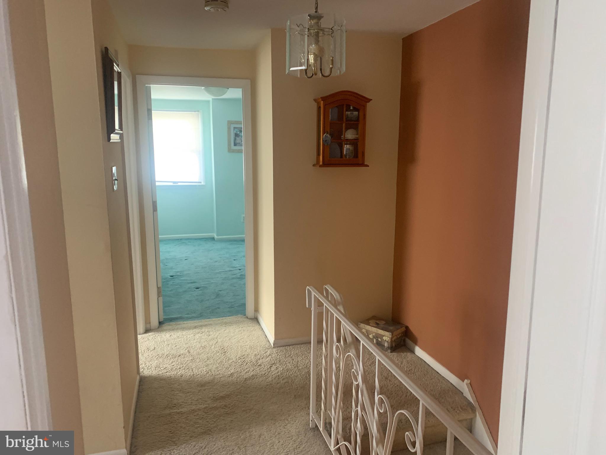 9902 Medway Road Philadelphia, PA 19115 - Photo 12 of 28 a view of a hallway with wooden floor