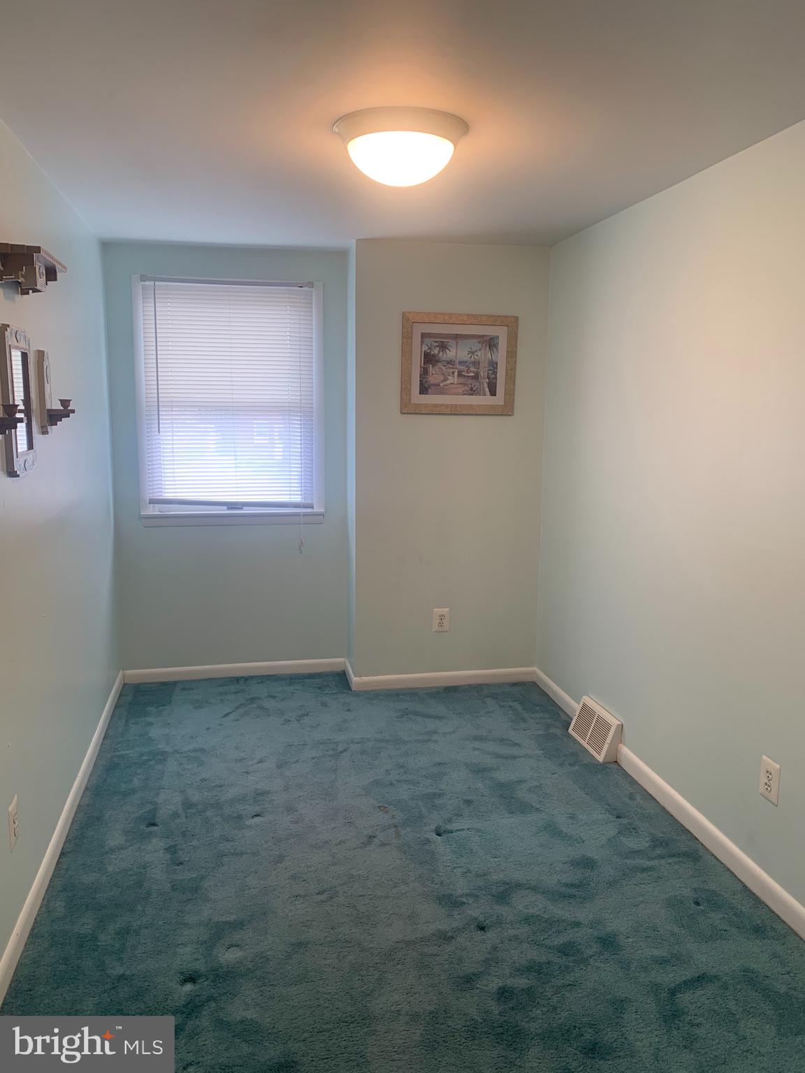 9902 Medway Road Philadelphia, PA 19115 - Photo 15 of 28 an empty room with a window