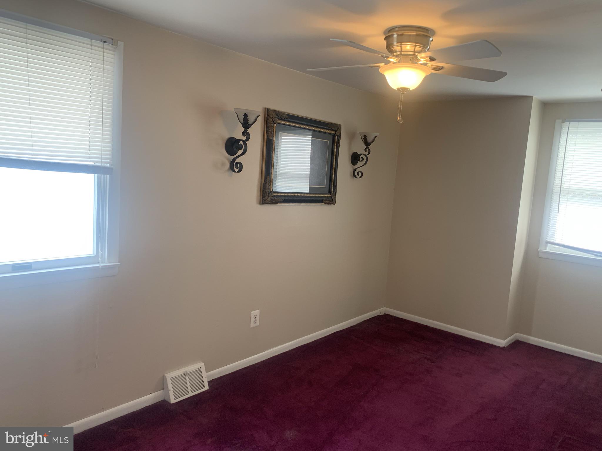 9902 Medway Road Philadelphia, PA 19115 - Photo 17 of 28 an empty room with windows and fan