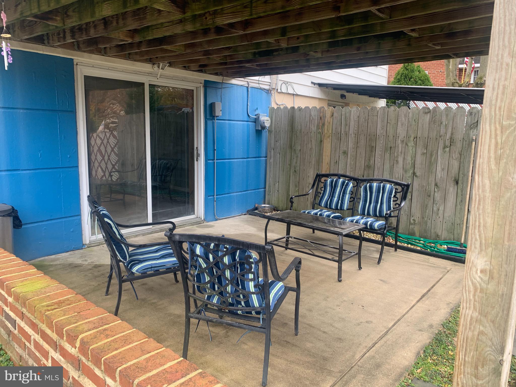 9902 Medway Road Philadelphia, PA 19115 - Photo 19 of 28 a view of porch with a table and chairs
