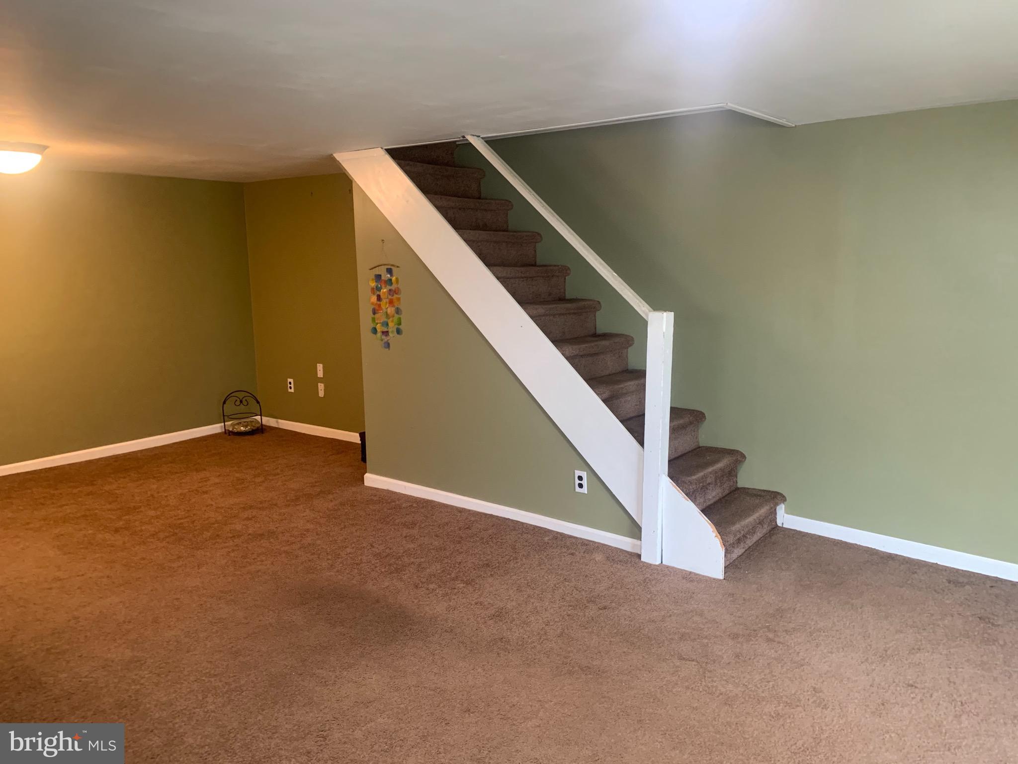 9902 Medway Road Philadelphia, PA 19115 - Photo 21 of 28 a view of an empty room with windows